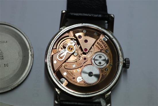 A gentlemans early 1960s stainless steel Omega manual wind wrist watch.